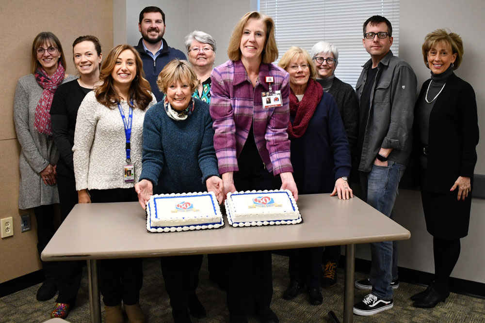 VNA 50th Anniversary cake and Board members at 1.23
