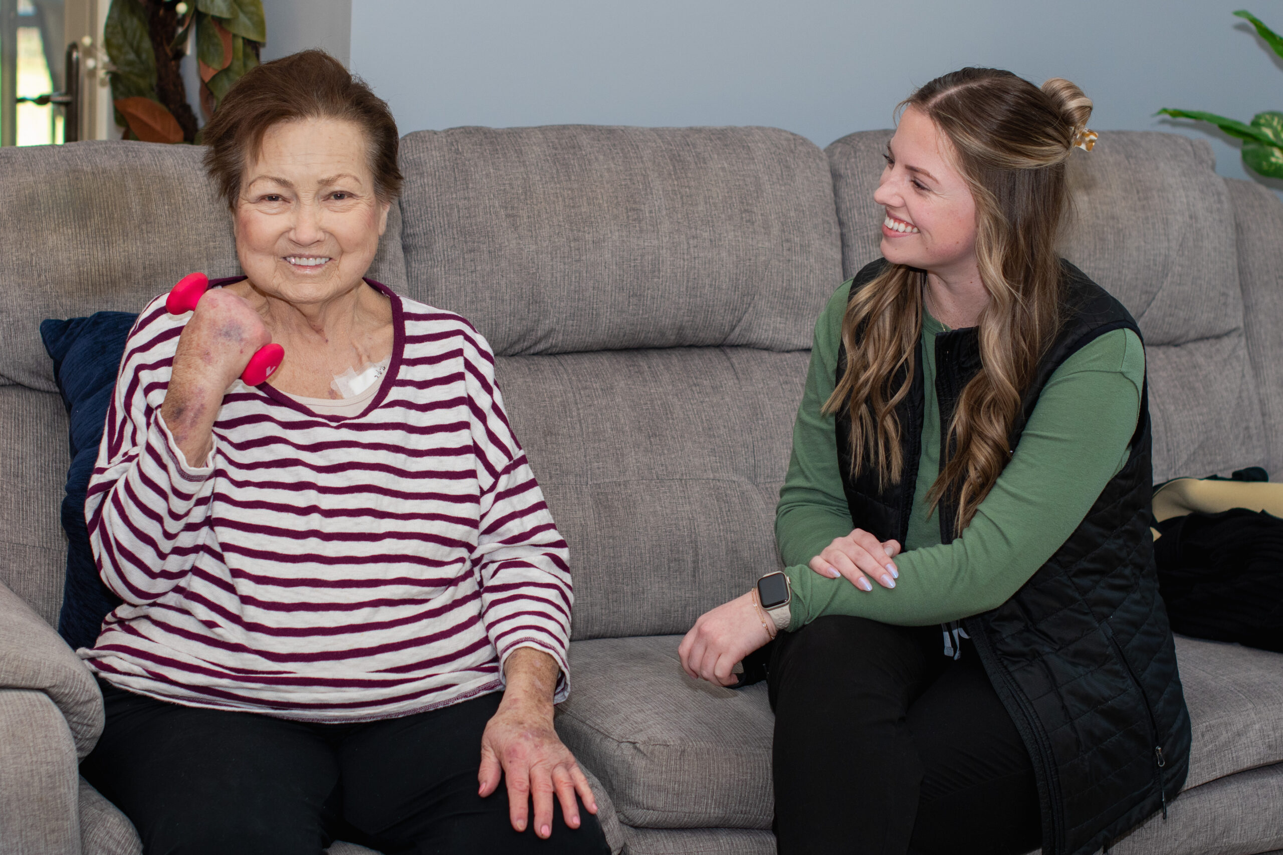 A VNA COTA walks a patient through some OT exercises.