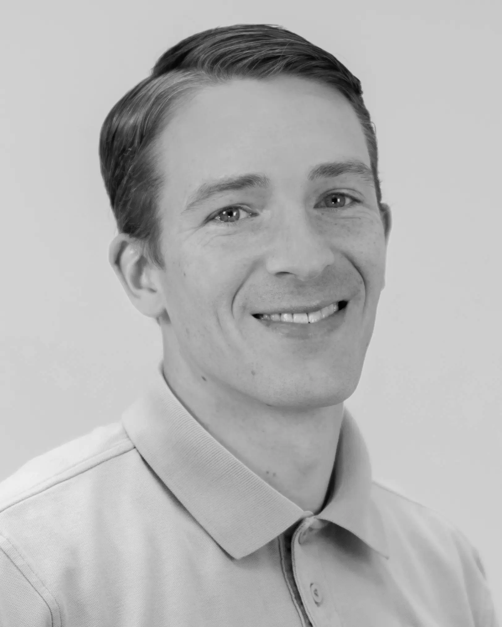 Black and white portrait photo of VNA's Director of Marketing, Casey Waniska.