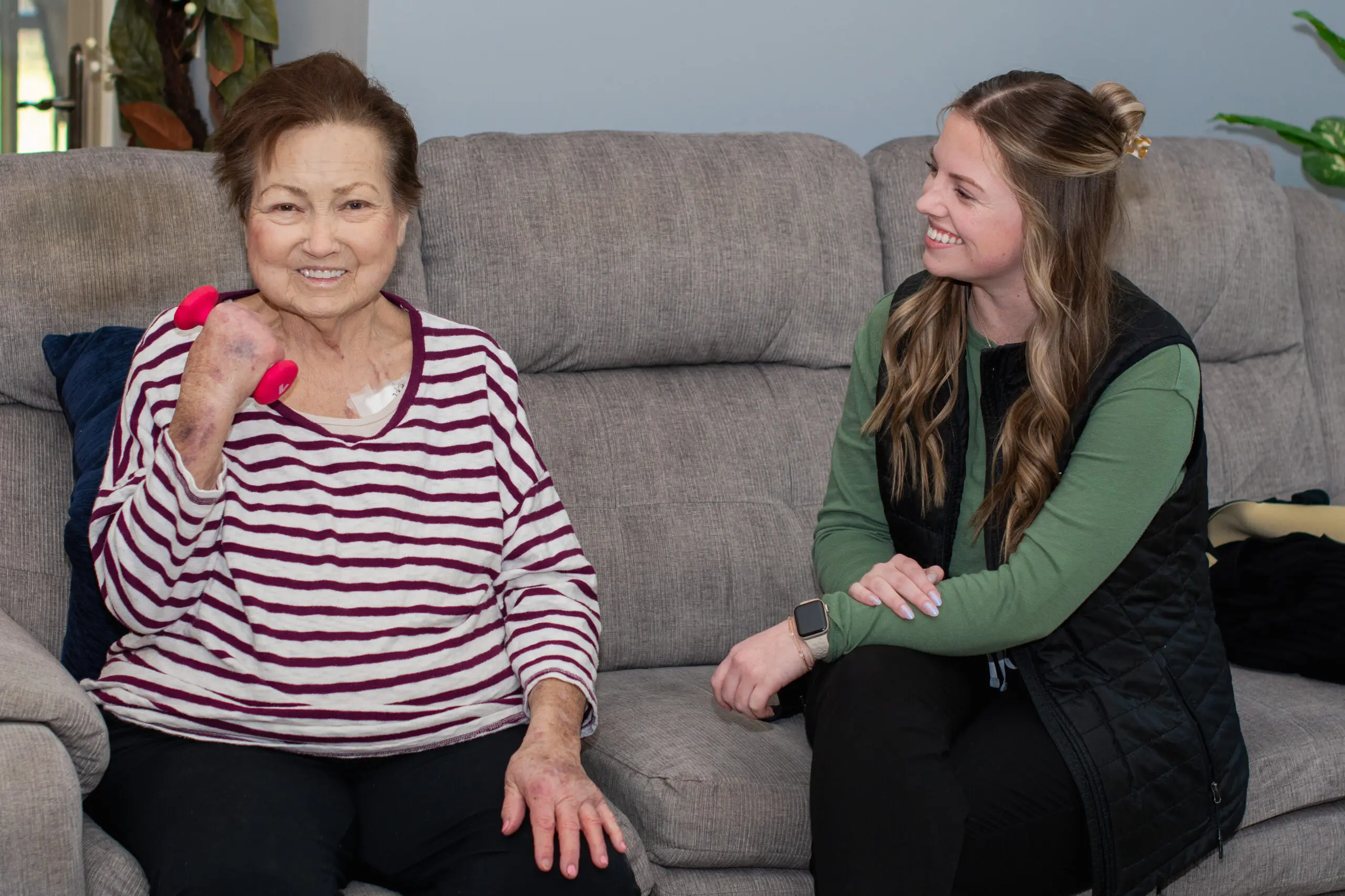A VNA COTA walks a patient through some OT exercises.